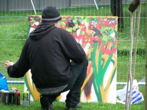 APPLE CART FESTIVAL - PAINTING IN THE RAIN